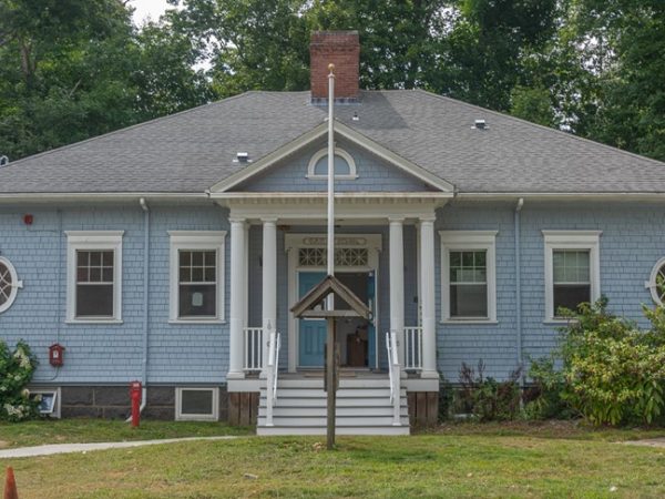 Why did it cost the town $1.2 million to build three tiny apartments on Oak Street?